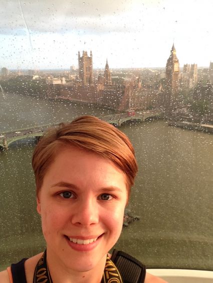 selfie of woman with london skyline in background